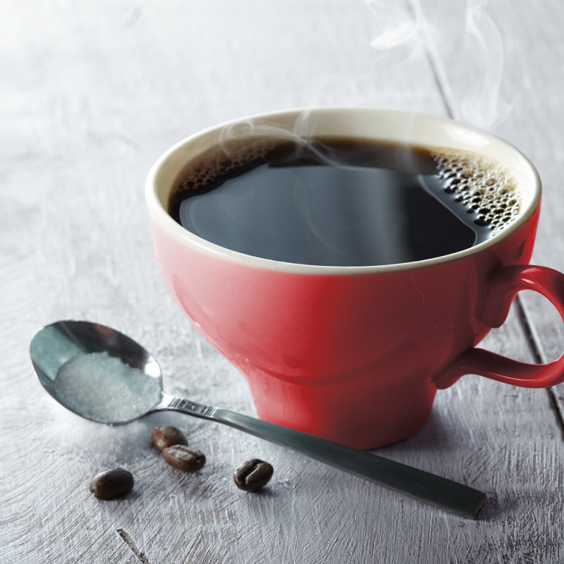 Community coffee in red mug